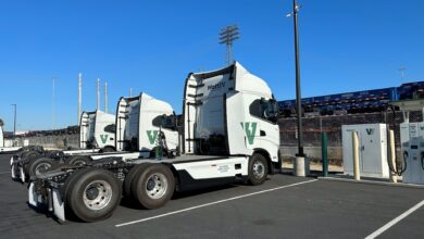 Nikola Tre batteryy-electric trucks at Watt EV chargers in Long Beach, California