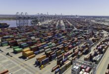 Containers at a marine terminal. Aerial view on a sunny day.